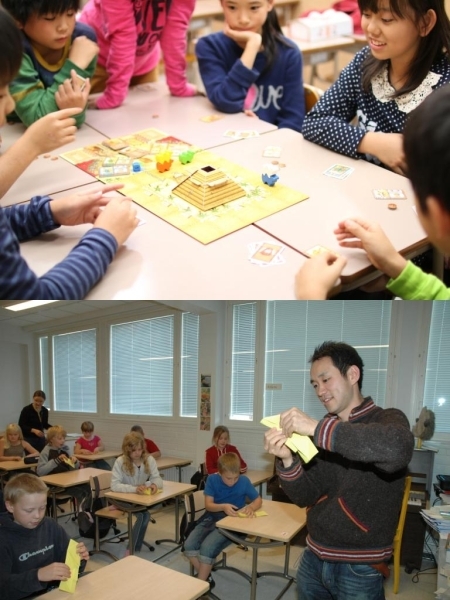 ▲ 上）ボードゲームを楽しむ生徒たち。　下）フィンランドでの授業風景。日本の文化を教える授業で折り紙を教える丸山先生。