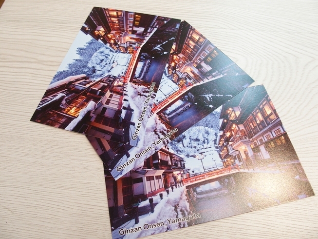 配布している銀山温泉のポストカード「アンケートのご協力お願いいたします！」