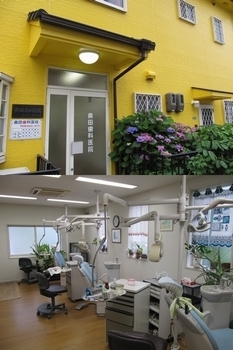 「奥田歯科医院」黄色の建物が目印！　保険治療を主体に治療を行っています。