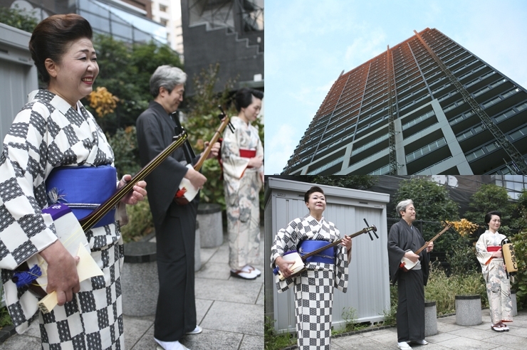 夕焼けが　高層ビルの色付けをする時刻<br>ご挨拶がてらの　曲が　響く