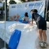 南葛SC試合前イベント「COOL SPLASH(クールスプラッシュ)」開催!真夏に雪遊びソリ体験!