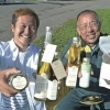 代表取締役社長 佐藤 健司 さん(写真左側)