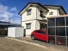 施工前「片持ちカーポート前に目隠しフェンスを新設｜視線配慮と来客用駐車スペースを両立」