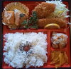 「明日の日替り弁当は鶏のピザ風」