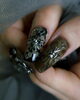個性派ネイルで魅力を最上級に「クロス×レース×ピアスネイルでつくるダークゴシックな指先💅」