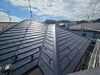 屋根金属カバー工事施行後「相見積もりからのご相談｜ガルバリウム鋼板の金属カバー工事を行いました」