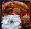 「明日の日替り弁当はお魚のマスタード焼き」