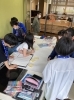 報告会に向け班でグループ作業「第一回事後研修」