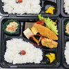 710円の幕の内弁当。やまね自慢のおかずがぎっしり詰まった人気の一品です。「【西大寺・仕出し】春の山菜おこわ弁当🍱 本日は人気の「麻婆春雨」や「天ぷら」が並んでいます！」