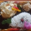 「明日の日替り弁当はお魚のチーズ焼き」