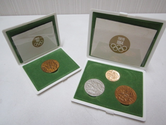 「伊丹市鴻池のお客様。東京オリンピックの記念メダルのお買取りです。メダルを売るなら、おたからやJR伊丹店！」