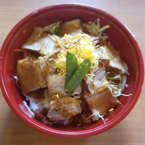 「明日の日替り弁当は角煮丼」