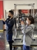 撮影のポイントを聴くスタッフ「会員様のお写真を綺麗に撮り隊！【浜松市南区　パーソナルジム　キックボクシング　体験】」