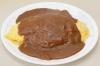 カレー粉で炒めたライスをふわふわ玉子で包んだオムカレー「カレーハウス盛」