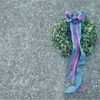 グニユーカリのくすんだグリーンに合わせたリボン「クリスマスリース」