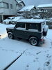 雪が積もったジムニー「雪ですねぇ」