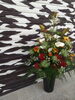 赤のバラから伸び伸びと咲く花たち「祝オープンのアレンジ花」