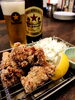 若鶏の唐揚げと瓶ビール「8月の営業、本日より開始です！」