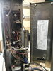 側面を開けたところです。「その場でストーブ分解清掃致します。　」