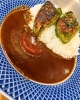 A．日替わり　ピーマンの肉詰め乗せカレー「2/6. ランチメニュー（#本八幡カレー#本八幡ランチ）」