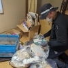 片づけ中「片づけを業者に依頼するメリット」