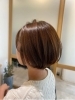 「ふんわり丸みショートボブで魅せる！ブラウン×艶感が光る最新スタイル」