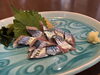 サンマ造り「新鮮な青魚の刺身が彩る一皿!丁寧な盛り付けと旬の味覚をお楽しみください」