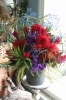 華やかなアレンジメント「情熱的なフラワーアレンジメント」