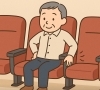 映画を観る人「映画館での身体の痛み」