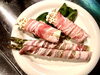 鉄板アスパラとエノキの豚バラ巻き各2個1180円「おつまみに最適！「鉄板アスパラとエノキの豚バラ巻き」1180円／お好み焼き・鉄板焼きしぐれ／磯子区岡村」