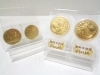 「宝塚市平井のお客様。御在位60年記念、御即位記念10万円金貨のお買取りです。金貨を高く売るなら、おたからやJR伊丹店へ。」