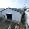 作新建装の施工事例　工場倉庫の外壁塗装・屋根カバー工事