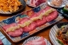 食欲そそる！特選ホルモン焼肉「お酒にもご飯にも◎人気メニュー・牛タンネギまみれ」