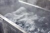 「湯気立ちこめる精練釜の迫力を間近で体感する工場見学ツアー」