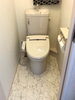 施工前(お掃除しにくい床の奥)「タンク下掃除も収納も一気に解決！スッキリトイレリフォーム」