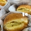 新作のピスタチオ生ドーナツをご用意しています！　/ パン工房かおりほのか（岡山市南区）