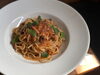 「本日の旬魚で楽しむトマトベースパスタ「プッタネスカ」」