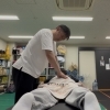 月に数日、大学水泳部の選手たちへおこなうボディ・ケア。