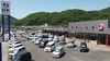 新見市石蟹の国道180号線沿い、大きな看板が目印「車のことなら何でも、自光モータースへお任せください！」