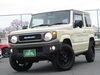 状態のいい軽自動車が豊富！「ベージュのスズキ ジムニー入庫！カバ柄スペアタイヤカバー付きの一台です」