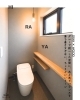 「施工事例｜グレー×木のトイレ空間」