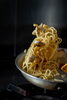 コースの一品のパスタ「さて！本日もお待ちしております🙇イタリア料理プラネタリオ」