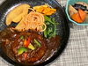 「本日のAランチは　煮込みハンバーグ　デミソース」