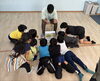 クッブ世界大会の映像を見つめる子どもたち「【放デイ】作戦を練る為に【札幌市北区児童デイ】」