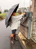 「雨のなか息子と一緒にポスティングへ　地域の皆さまへ外壁塗装のチラシをお届けしました」