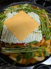 「旨辛スープにとろけるチーズと麺が絡み合う熱々の부대찌개（ブデチゲ）」