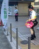 「阪急長岡天神駅前で、中小路市長らと『ごみの減量に役立つ水切り袋』を配布しました　(有)長岡美装社」