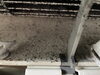 清掃前の空気の吹き出し口とファン「リビングのエアコンは特に汚れやすいです！」