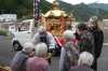 お米の代わりに少しのお金を半紙で包んでお供え「神輿がファミリア愛に来てくださいました。」