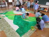 劇の背景画「World　stage　in　ASO　に向けて…」